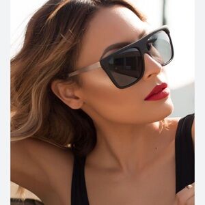 Quay x Desi Perkins on the low sunglasses